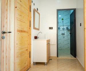 a bathroom with a sink and a shower at 2 Voies Résidence in Dakhla +73 photos