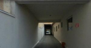 an empty hallway of a building with a long corridor at Cedro Assis hotel in Assis