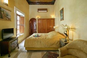 Postel nebo postele na pokoji v ubytování Riad & Spa Esprit Du Maroc