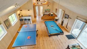 an overhead view of a ping pong table in a room at Villavilla 474 - Grenå Strand, Østjylland in Grenå
