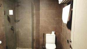 Ein Badezimmer in der Unterkunft Grand Hotel Central Conakry