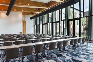 an empty lecture hall with chairs and windows at Element by Marriott Phoenix North Norterra in Phoenix +43 photos