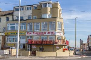 a building on the corner of a street at New Promenade Hotel in Blackpool