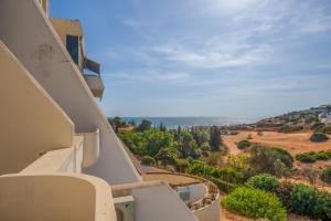 a view of the ocean from the balcony of a house at Ocean View - XL Terrace - Beachfront by Tenório in Lagos