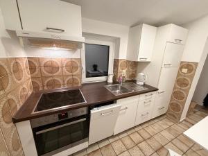 O bucătărie sau chicinetă la Schäferkoppel