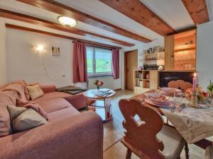 a living room with a couch and a table at Neubert in Breitenbrunn +20 photos