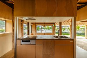 a kitchen with a sink and a counter top at ICHI -en- in Fujikawaguchiko