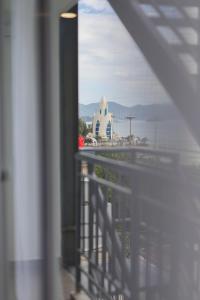 a view of a building from a balcony at Sea Light Hotel Nha Trang Beach in Nha Trang