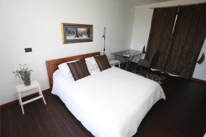 Postel nebo postele na pokoji v ubytování Apartment Larin