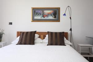 Postel nebo postele na pokoji v ubytování Apartment Larin
