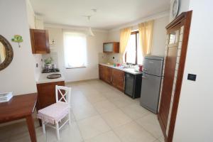 Kuchyň nebo kuchyňský kout v ubytování Apartment Larin