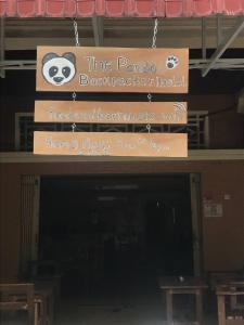 a sign for the panda back packer hospital at The Panda Backpacker Hostel in Kampot