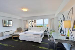 Katil atau katil-katil dalam bilik di Hotel Miramar