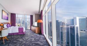 a hotel room with a view of a city at Park Regis Business Bay in Dubai