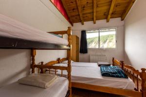 Postel nebo postele na pokoji v ubytování Alberg La Solana + 37 fotografií