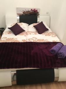A bed or beds in a room at Synagogue Gozsdu Private Apartments