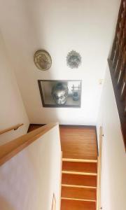 a staircase in a home with white walls at 富士見旅館101 in Fujiyoshida