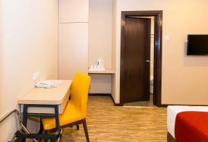 TV a/nebo společenská místnost v ubytování Icon Hotel Segamat