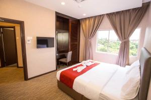 Postel nebo postele na pokoji v ubytování Icon Hotel Segamat + 37 fotografií