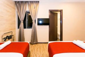 TV a/nebo společenská místnost v ubytování Icon Hotel Segamat