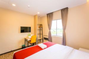 Postel nebo postele na pokoji v ubytování Icon Hotel Segamat