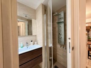 a bathroom with a sink and a mirror at Dimora Imperiali in Francavilla Fontana +24 photos