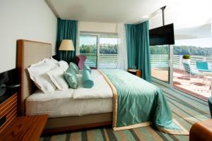 Postel nebo postele na pokoji v ubytování Hotel Navis