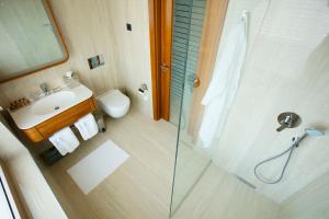 Koupelna v ubytování Hotel Navis