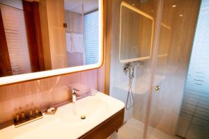 Koupelna v ubytování Hotel Navis