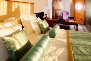 Postel nebo postele na pokoji v ubytování Hotel Navis