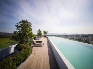 a view of a swimming pool on top of a building at Laguna SkyPark in Laguna Phuket