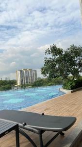 a view of a large pool of water with buildings at Putrajaya Antara Residence, Near PICC, Presint 5 in Putrajaya