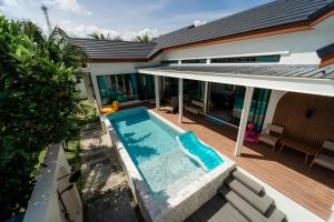 an image of a house with a swimming pool at PHUM Villa Songkhla in Ban Saphan Yao
