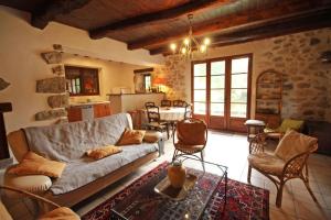 a living room with a couch and a table at Beaufort in Blond