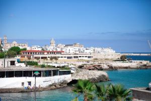 a bridge over a body of water with a city at B&B Portorosso in Monopoli