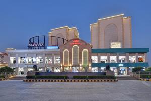 a large shopping center with a large building at AR Suites Sohna Road in Gurgaon