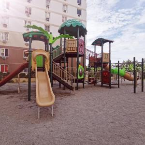 a playground with a slide at Affordable Condo Unit in Saekyung Phase 3 in Suba