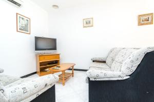 TV a/nebo společenská místnost v ubytování Can Parrita