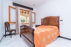Postel nebo postele na pokoji v ubytování Can Parrita