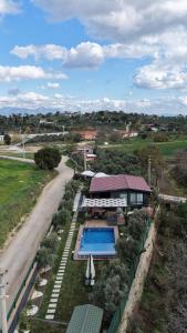an aerial view of a resort with a swimming pool at Akcavillagarden in İzmir