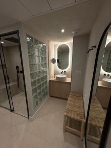 a bathroom with two sinks and a mirror at Mercure Nice Marché Aux Fleurs in Nice +129 photos