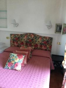 Postel nebo postele na pokoji v ubytování B&B Le Palme