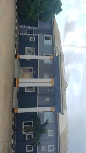 an overhead view of a building with trees on it at AP Luxury Inn in Idowu