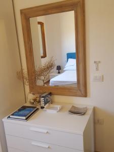 Ένα ή περισσότερα κρεβάτια σε δωμάτιο στο Casa i Falchi +43 φωτογραφίες