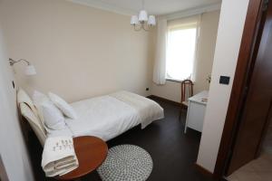 Postel nebo postele na pokoji v ubytování Apartment Larin