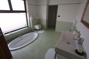 Koupelna v ubytování Apartment Larin