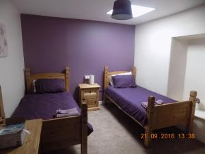 Postel nebo postele na pokoji v ubytování Cú Chulainns Accommodation