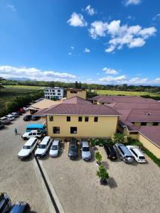 an overhead view of a parking lot in front of a building at Lake Naivasha Lazarus Lodge in Naivasha +101 photos