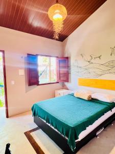 a bedroom with a large bed in a room at Recanto do cajueiro in Flecheiras +54 photos