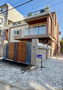 a house with a fence in front of it at Shobhalay- Premium 2BHK Parking prime location super interior in Rānchī
